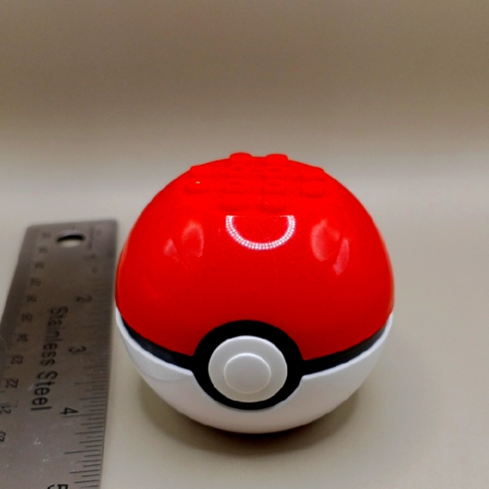 Red and White Poké Ball Toy